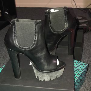 Black Versace ankle boot.